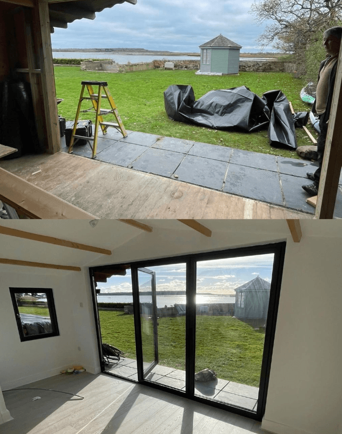 Bathroom with a bath, shower screen and a black heated towel rail