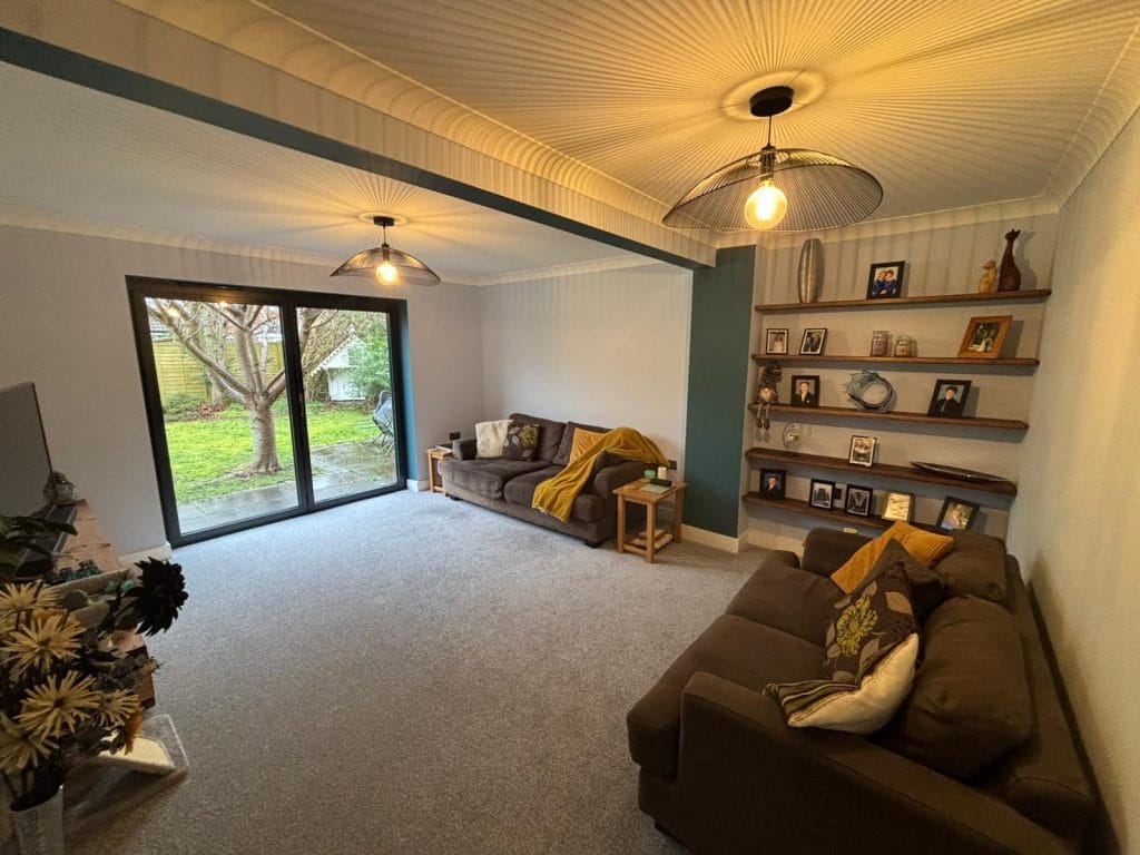 Dressing area with fitted wardrobes and a vanity with round mirrors