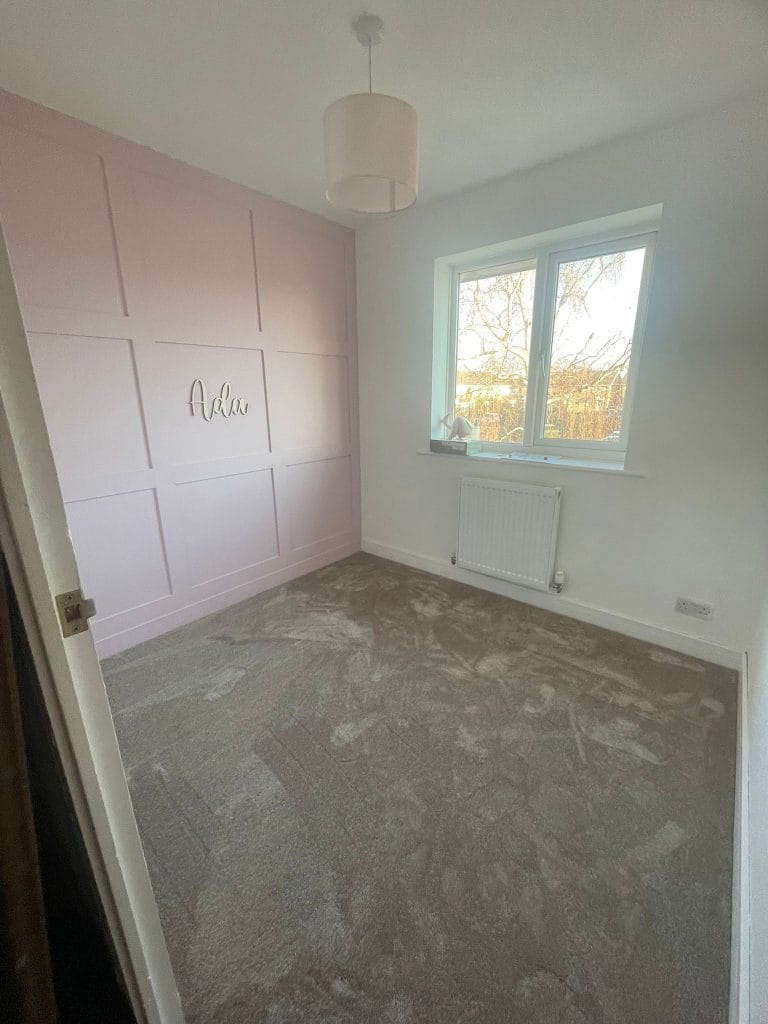Garden room interior with a hot tub and timber decking