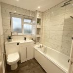 bathroom renovation project we completed in throop. modern and fresh final look, all new sanitary ware and a built in unit was put in place for all the shampoos etc. Project by The Big Conversion Company.